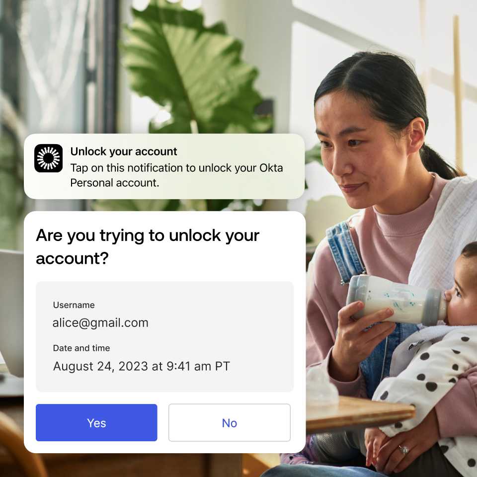  Image of Okta Personal push notification asking “are you trying to unlock your account?” overlaying image of woman in overalls sitting at table giving her baby a bottle while looking at laptop