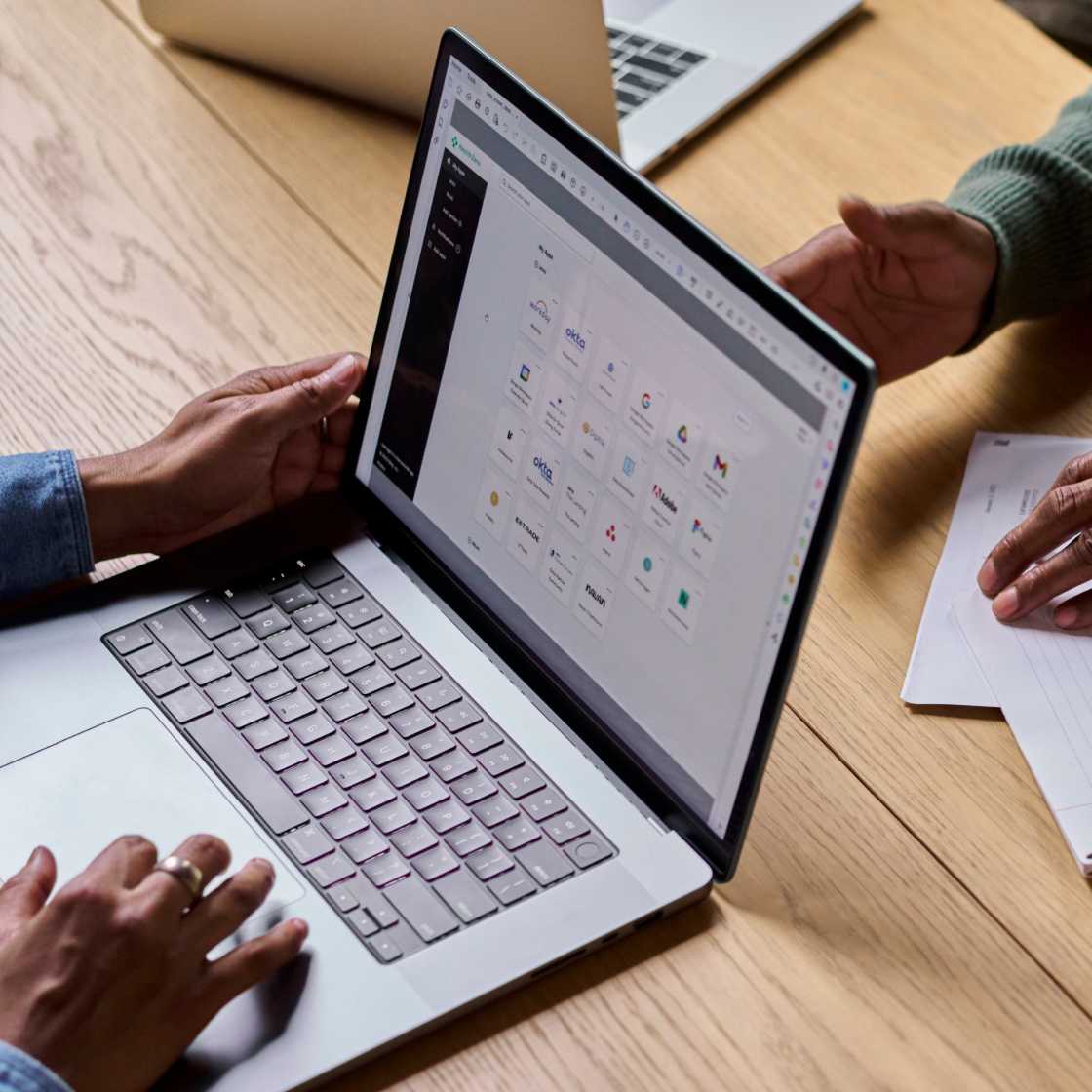 Image of hands using a laptop 