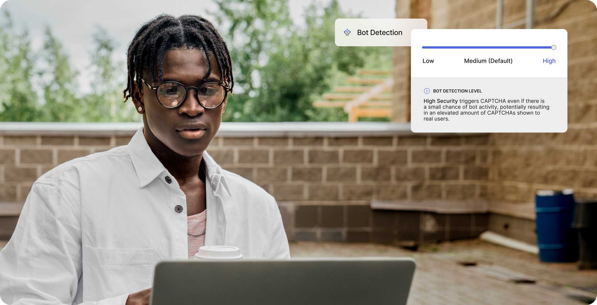 Man on laptop seeing a notice that Bot Detection is high.