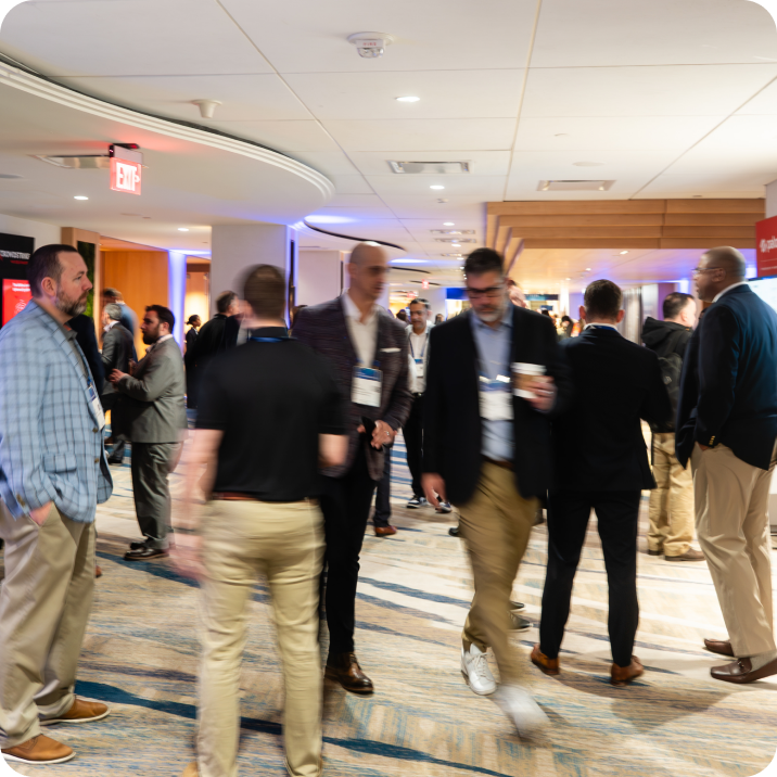 Business leaders in a Okta conference discussion.