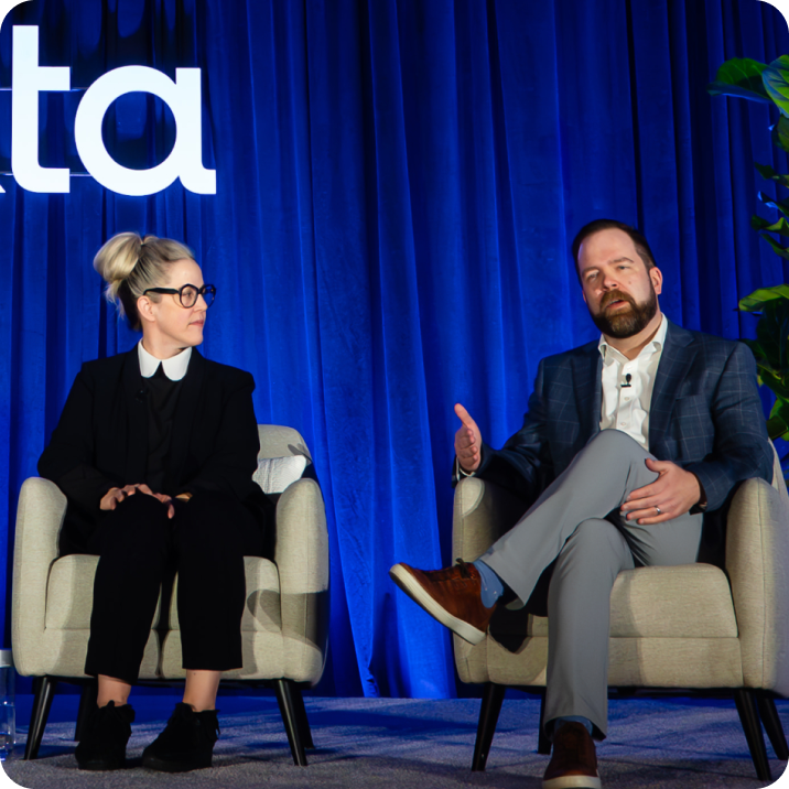 Professional networking at Okta conference.