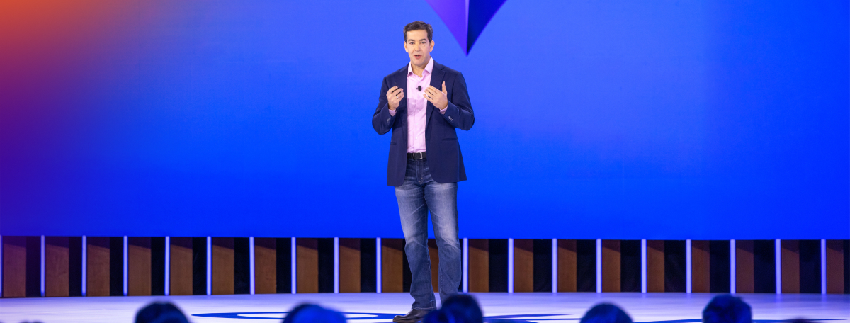 Todd McKinnon presenting keynote on stage