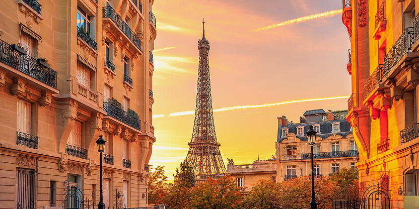 Eiffel Tower Sunset Framed by Parisian Buildings