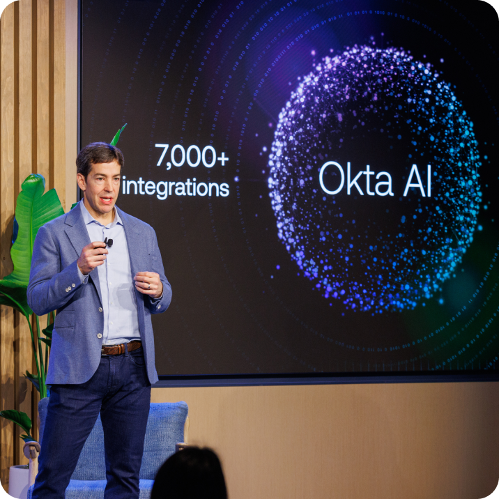 Todd McKinnon, CEO & Co-Founder at Okta presenting slide on a large stage.