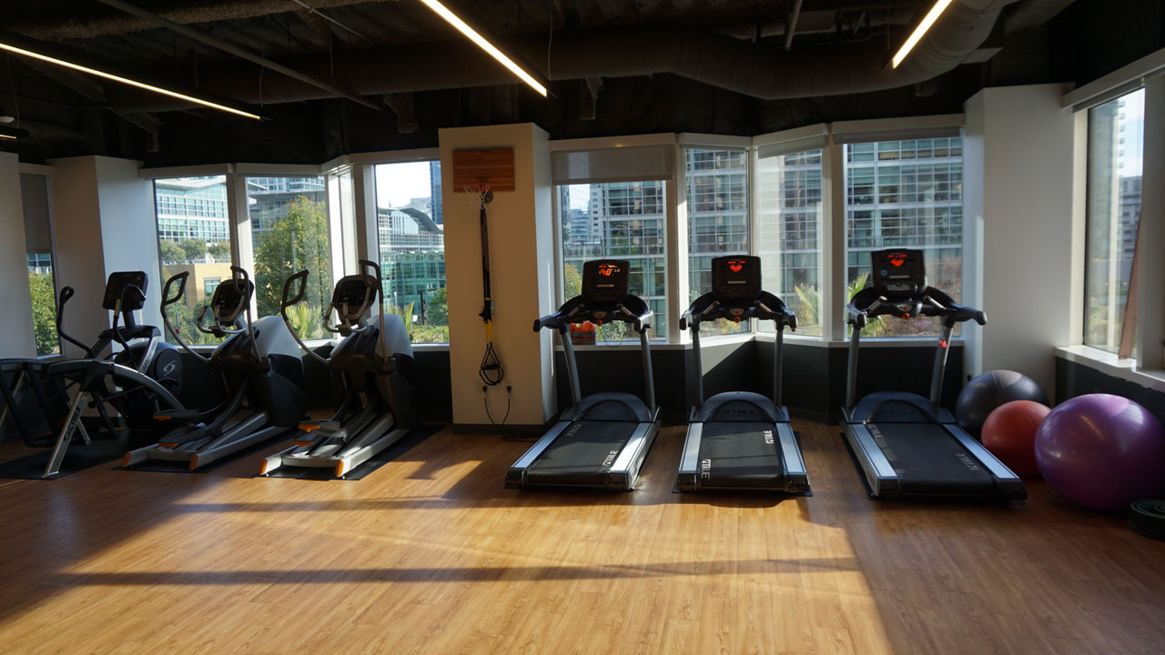 A gym that has weights, stationary bikes, and more 
