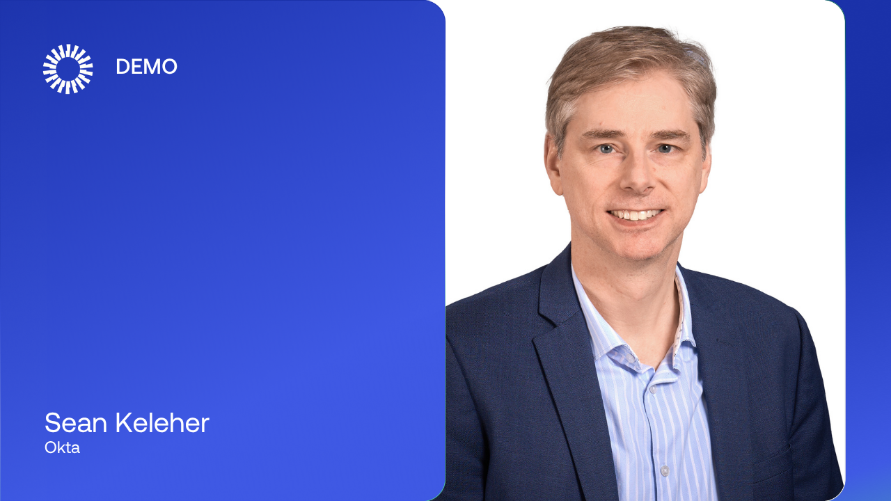 A formal event portrait featuring a headshot of Sean Keleher, Okta, alongside a blue panel with a "DEMO" logo.