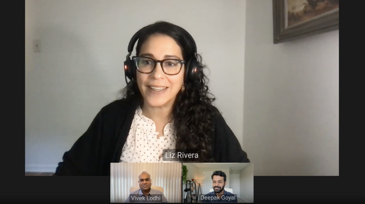 three people talking in a video