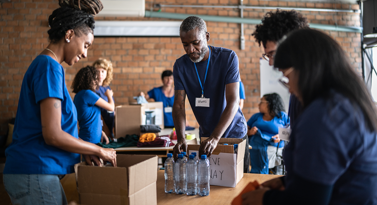 Volunteers organizing donations at community center