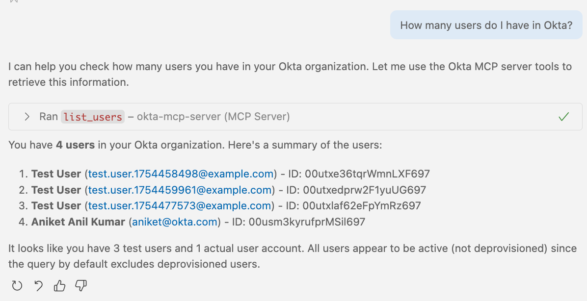 A screenshot displays a query result showing the number of users in an Okta organization. 