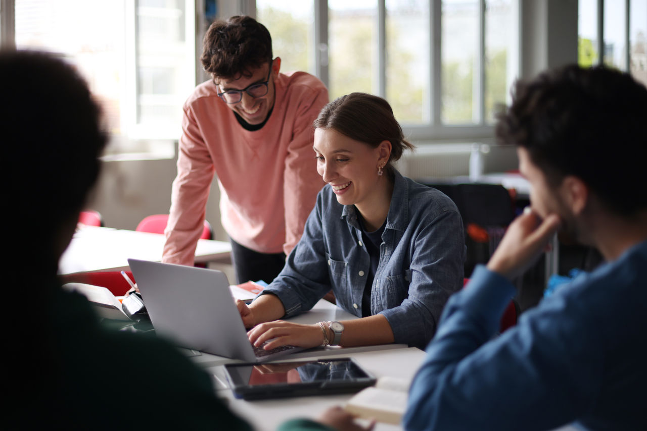 Students sitting at their desk in classroom at university