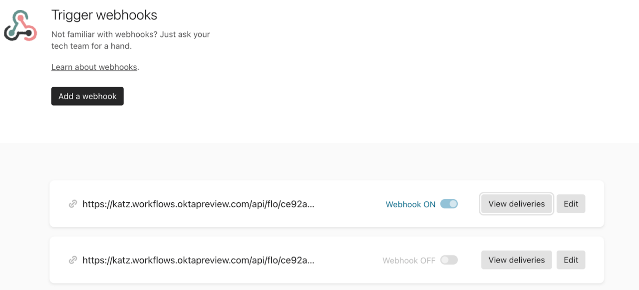 The image showcases a user interface for managing webhooks, featuring two distinct webhook URLs. 