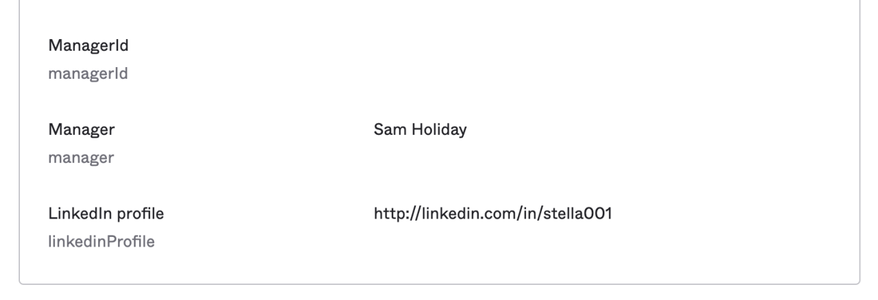 Okta profile attribute section showing Manager set to Sam Holiday and LinkedIn profile set to http://linkedin.com/in/stella001.