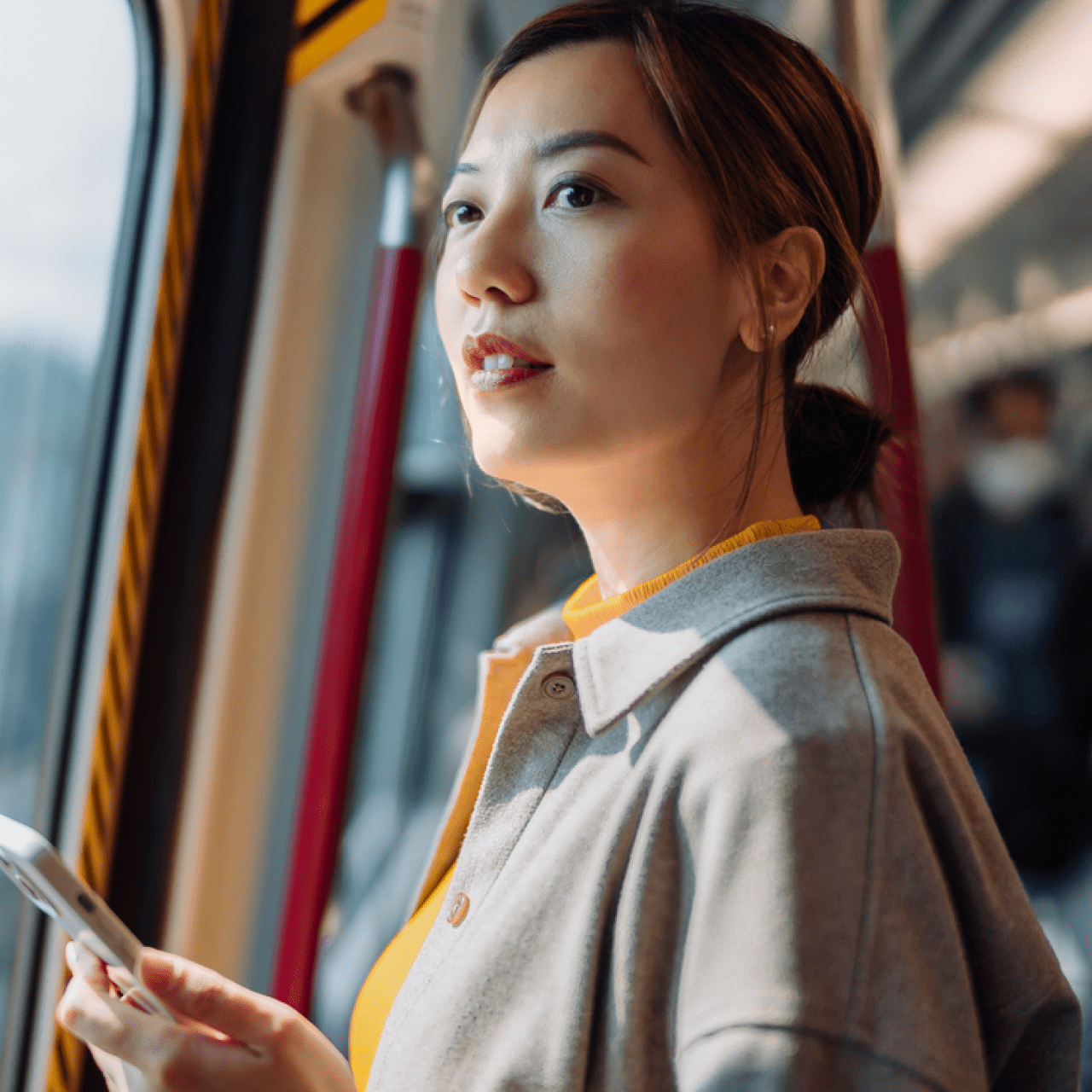 Female commuting on public transportation.